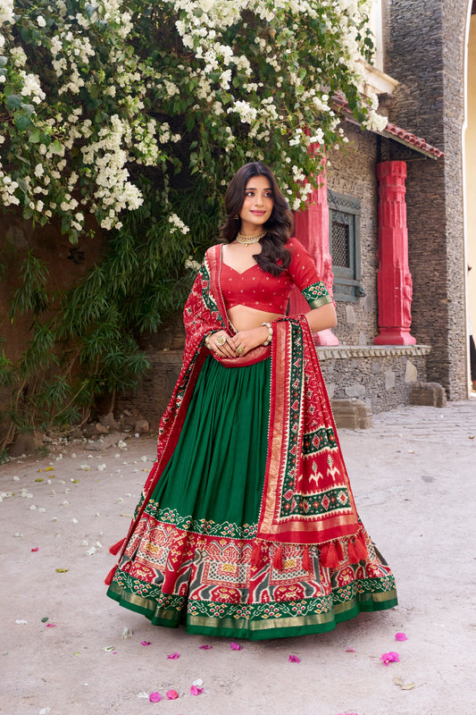 Green colour Tussar Silk and  Patola Printed lehenga with dupatta