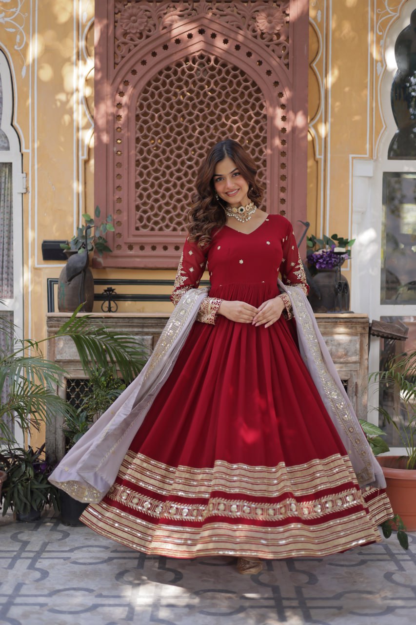 Red Color Blooming Fabric with Embroidery Work Gown Set.