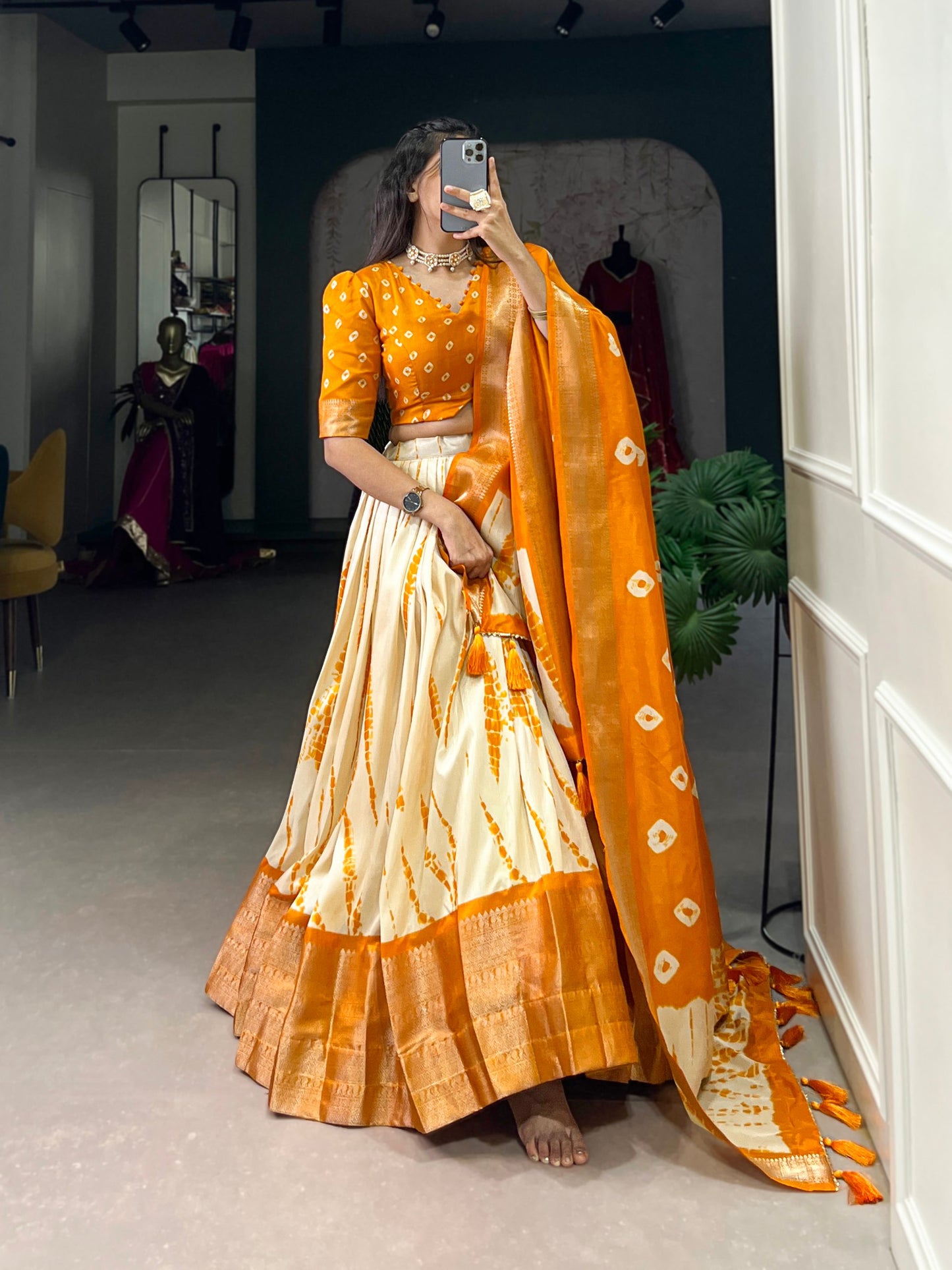 Orange And Cream Color Dola Silk Lehenga With Dupatta.