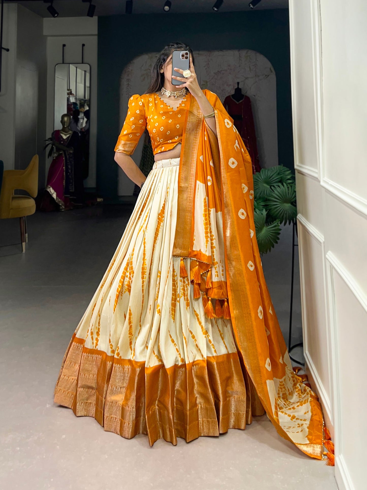 Orange And Cream Color Dola Silk Lehenga With Dupatta.