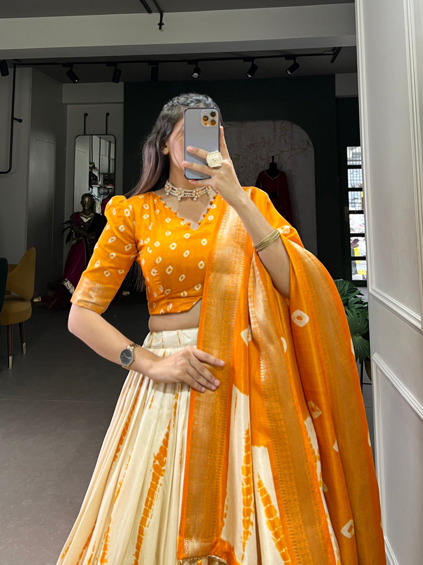 Orange And Cream Color Dola Silk Lehenga With Dupatta.