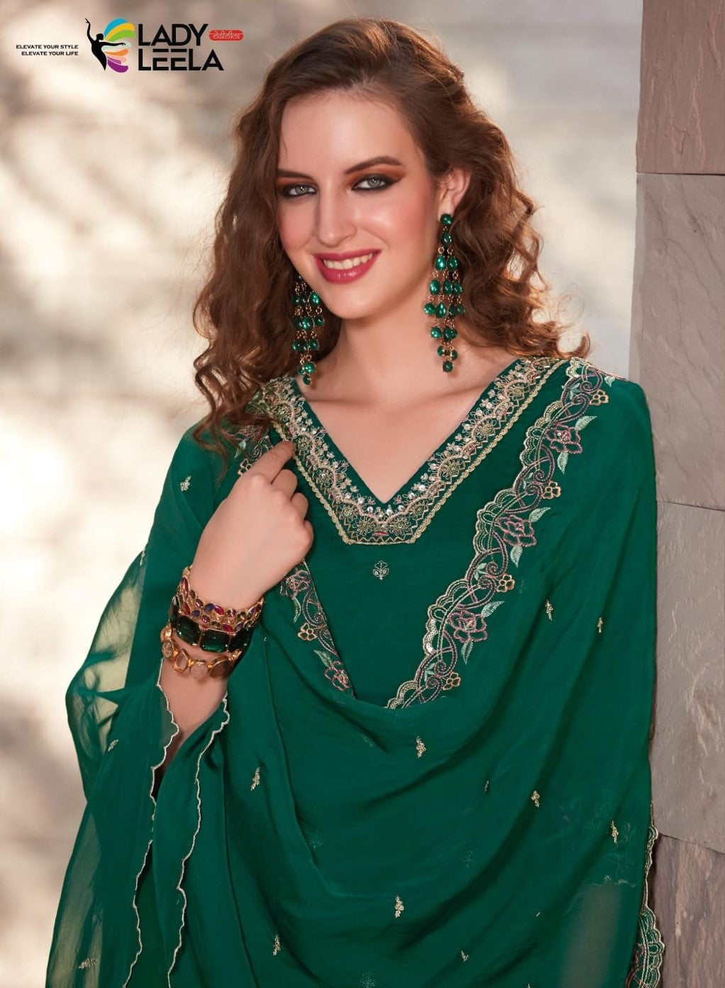 Beautiful v neck grenn color embroidery n handwork kurti with pants and dupatta. FV104