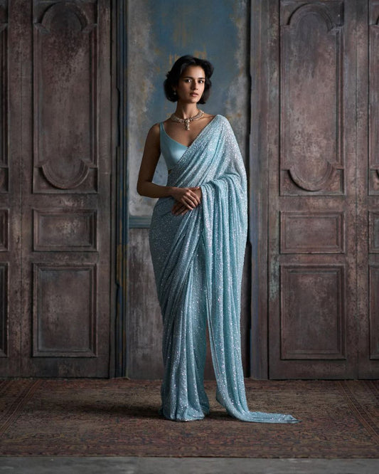 Glamorous Blue Faux Georgette Saree with Khichdi Sequence Work
