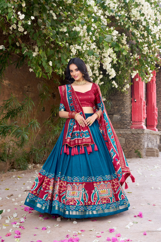 Blue colour Tussar Silk and  Patola Printed lehenga with dupatta