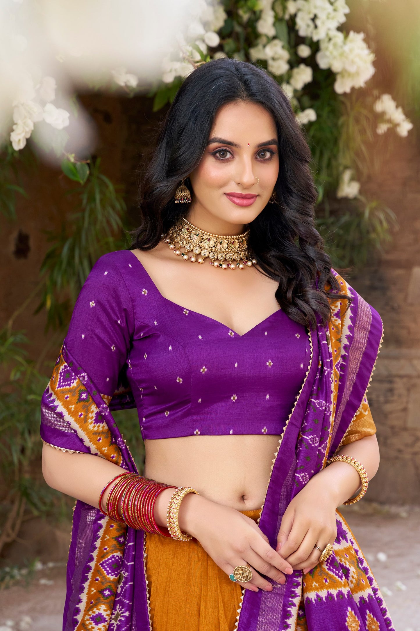 Yellow colour Tussar Silk and  Patola Printed lehenga with dupatta