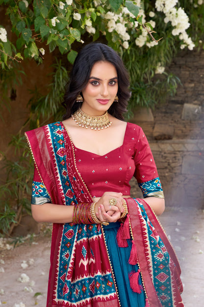 Blue colour Tussar Silk and  Patola Printed lehenga with dupatta