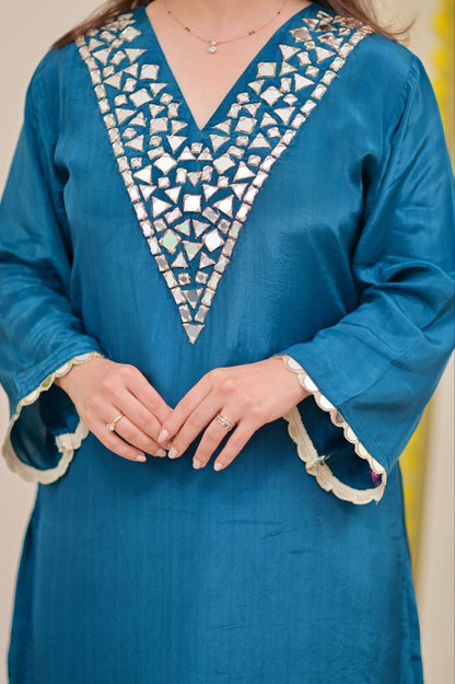 Beautiful Sharara Sets in stunning shades, adorned with exquisite real mirror hand embroidery work