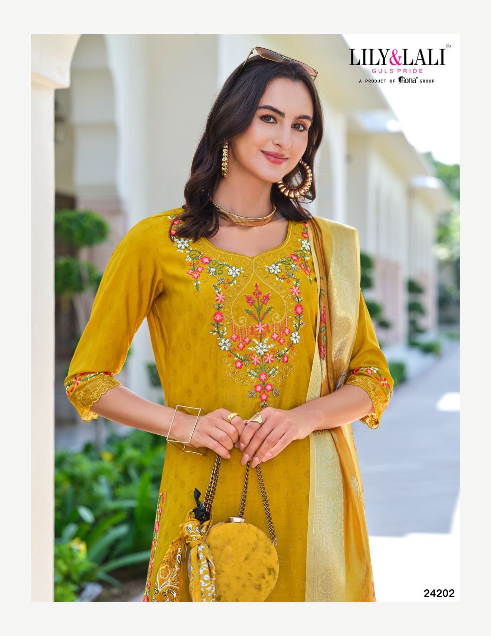Yellow Kurti in Embroidery Work And Jacquard Viscouse Silk.