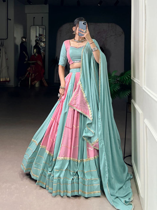 Pastel elegance meets festive tradition – this rayon with georgette chaniya choli