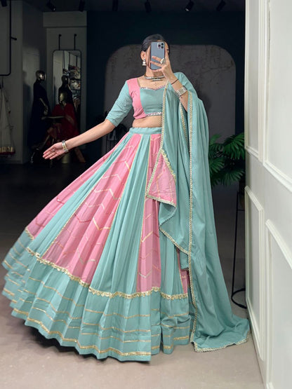 Pastel elegance meets festive tradition – this rayon with georgette chaniya choli