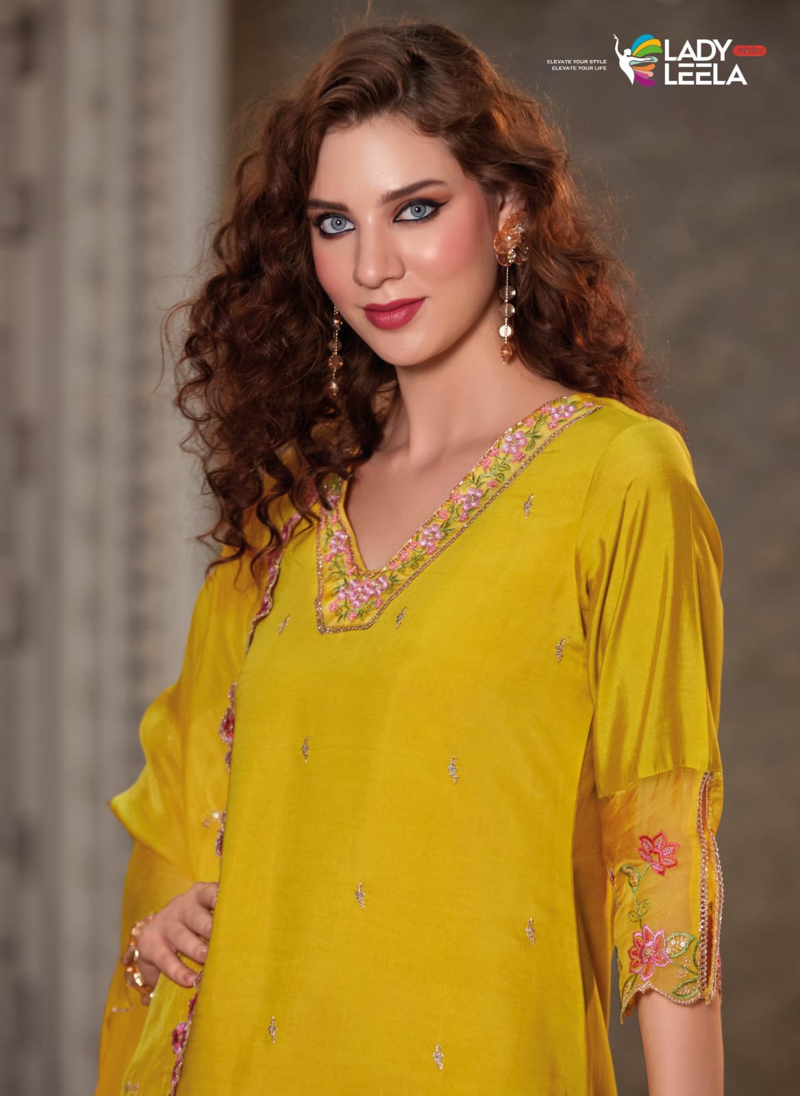 Beautiful v neck yellow color embroidery n handwork kurti with pants and dupatta. FV105