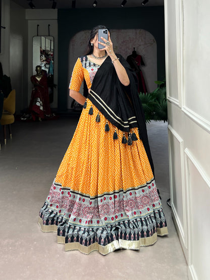 Trendy Yellow Rayon Lehenga with Bandhej & Ajrakh Print, Embossed Design and Gota Lace – Comes with Matching Dupatta